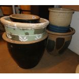 Quantity of glazed and terracotta garden pots.