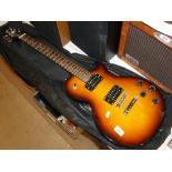 An electric guitar and case.