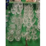 A suite of crystal drinking glasses.