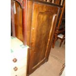 A 19th century French walnut single door armoire.