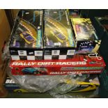 Quantity of Scalextric sets and extension packs.