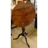 A George III mahogany tilt top tripod table.