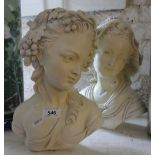 A pair of composition busts.