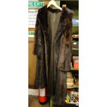 A full length mink coat.