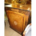 A Victorian walnut pier cabinet.