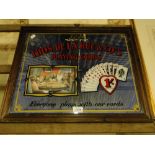 A framed advertising mirror T H O S. De La Rue Co's playing cards.