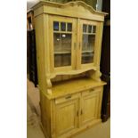 An Antique continental pine 2-section kitchen dresser.