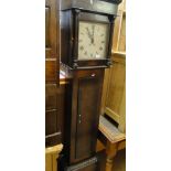 An 18th century 30-hour long case clock with square painted dial and one subsidiary dial, oak cased.