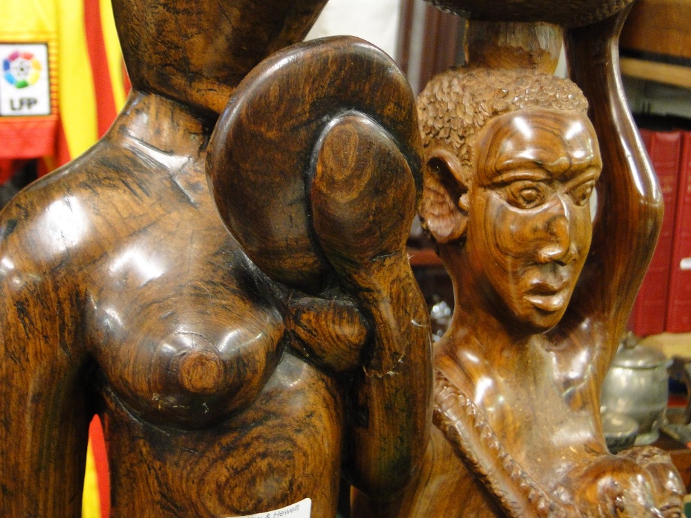 A pair of tall carved hardwood African figures. - Image 2 of 2