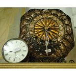 A wirework and glass clock and a small brass cased clock.