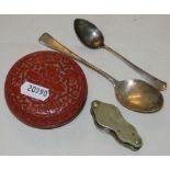 A cinnabar box, plated magnifier and 2 silver spoons.