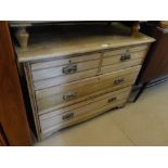 An Edwardian pine chest of 4-drawers.