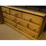 A modern pine 7-drawer chest.