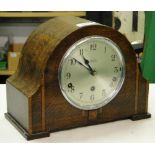 An oak cased mantel clock by F Butcher, Haywards Heat, with Westminster chimes, GWO.