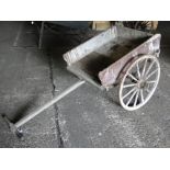 A Victorian painted pine open 2-wheeled cart, inscribed "E & N C," length 7', height 2'10".