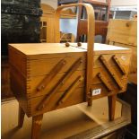 A cantilever sewing cabinet.