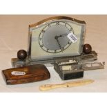 Chrome plated small Deco clock, a snuff box, miniature dice and a bone letter opener.