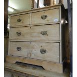 An Edwardian pine dressing chest with swing mirror.