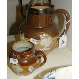 2 Doulton harvest jugs.