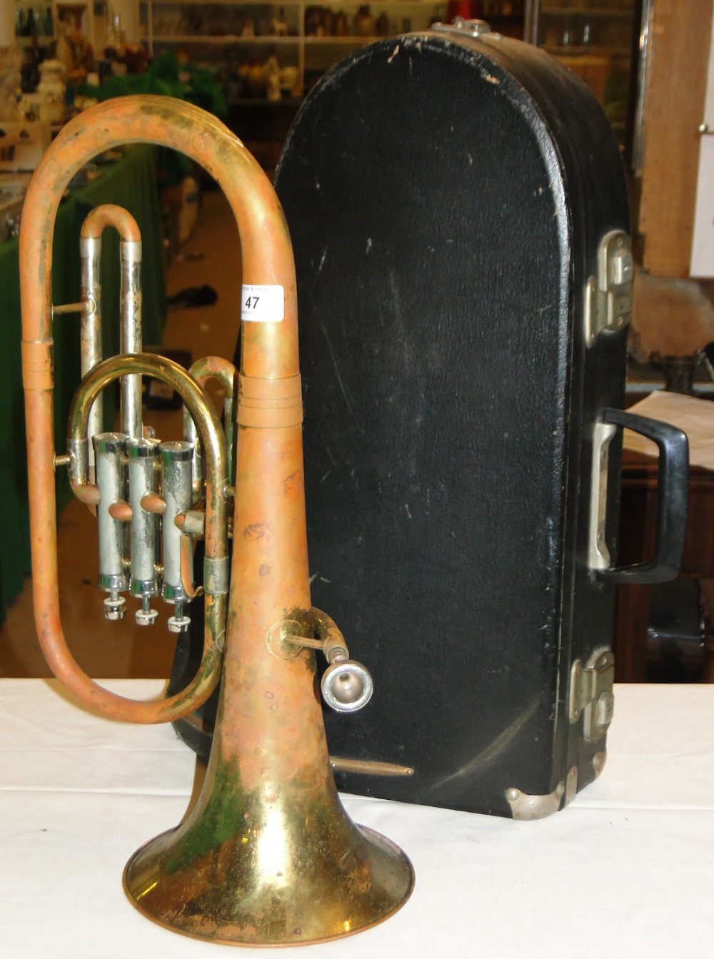 A Schenkelaars brass French horn in case.