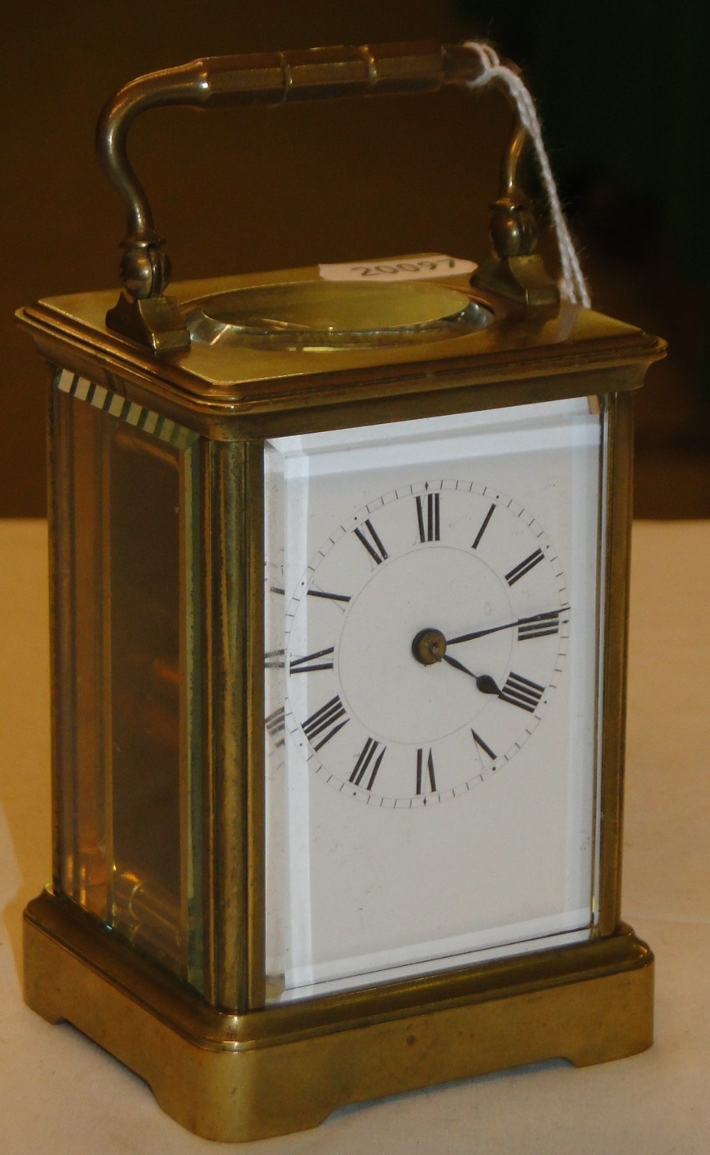 A brass carriage clock.