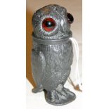 Antique pewter owl figure desk sander with glass eyes.