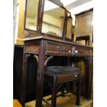 A mahogany triple mirror dressing table and matching stool.