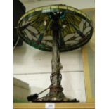 A Tiffany style table lamp with lead light dragonfly decoration to shade.