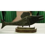 A bronze Niger fish river God mounted on stepped wooden plaque.