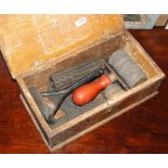 A decorator's graining roller, combs, stippler, etc., in pine box.