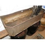 A Victorian cast-iron trough.