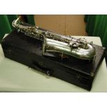 A silver plated Buescher saxophone, by Elkhart, USA, low pitch, circa 1914, cased.