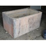 A large galvanised and studded water tank, length 5', height 2'8", width 2'11".