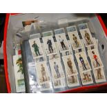 Sets of cigarette cards and loose cards.