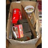 A quantity of tins and boxes.