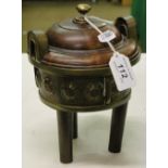 A Chinese censer on tripod supports with 4 character mark.