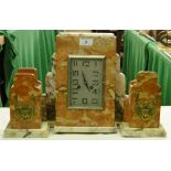 An Art Deco French coloured marble 3-piece clock garniture.