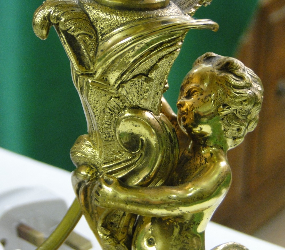 A gilt brass table lamp with cherub support and an Eastern brass table lamp with cow figure. - Image 2 of 2
