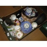 Various teaware and decorative plates.