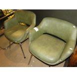 Pair of mid century armchairs with chrome legs.