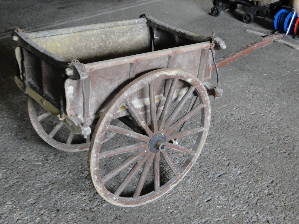 A Victorian painted pine 2-wheeled cart, height 3'2", length 6'8".