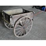 A Victorian painted pine 2-wheeled cart, height 3'2", length 6'8".