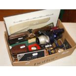 Fishing reel, tie press, pinking shears, etc.