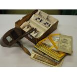 An Edwardian Stereo viewer and cards.