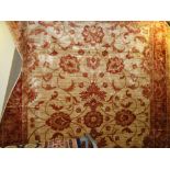 A beige ground Heriz carpet, 2.3M x 1.6M.