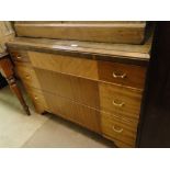 An Art Deco design walnut 3-drawer chest on bracket feet.