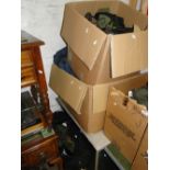 A large quantity of Army uniforms, clothing, camouflage items, etc.