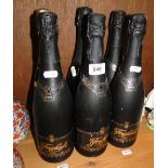 6 Bottles of sparkling wine.