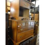 A Younger's chest of 3 drawers and a pair of matching bedside cabinets bearing label.