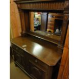 A Victorian oak mirror back sideboard.